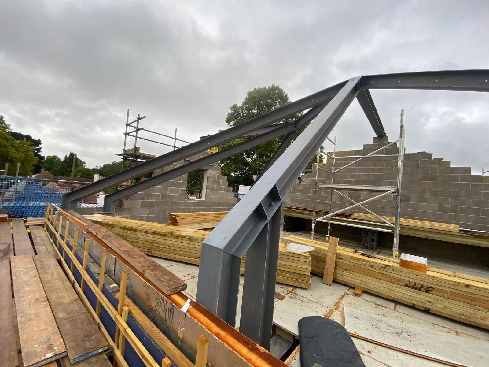 Structural steelwork fabrication and installation for a roof frame on a construction site in Southampton.